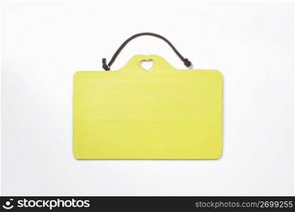 Yellow sign on white background