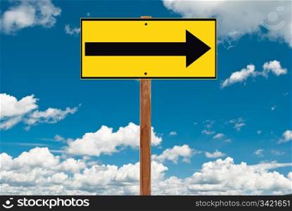 Yellow street sign at blue sky background
