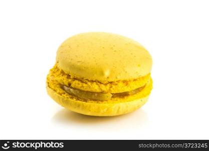 Yellow Tasty colorful macaroon with lemon flavor on white background