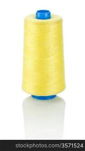 yellow thread on blue spool
