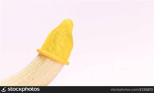 yellow unwrapped condom banana