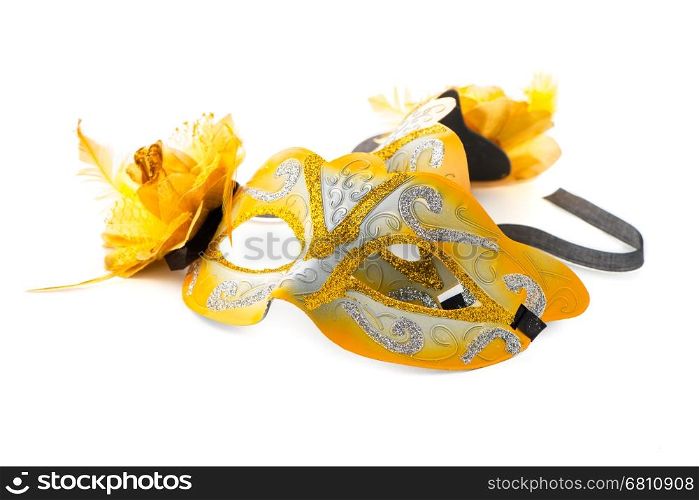 Yellow venetian mask for a party on a white background