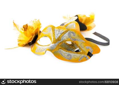 Yellow venetian mask for a party on a white background