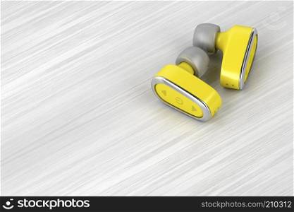Yellow wireless in-ear headphones on wood table