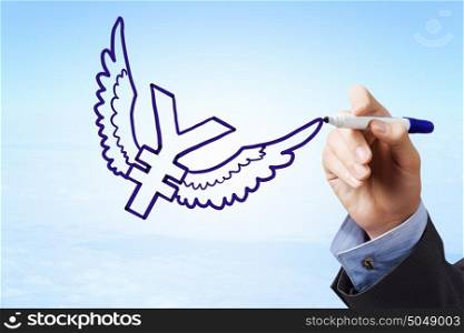 Yen currency rise. Businessman hand drawing yen flying sign on sky background