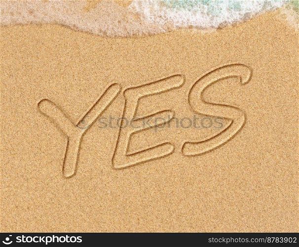 YES concept, positive changes in the life, word written on sand beach