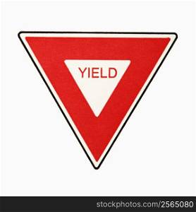 Yield road sign against white background.