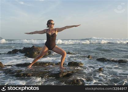Yoga along Mal Pais coastline in San Jose Costa Rica