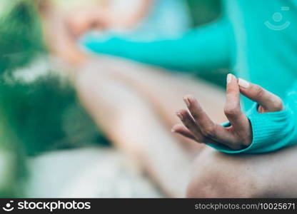 Yoga detail, lotus position mudra.