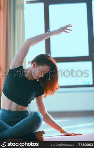 yoga girl sports hall / sport stretching, beautiful girl doing sports in the gym, yoga balance