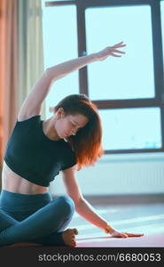 yoga girl sports hall / sport stretching, beautiful girl doing sports in the gym, yoga balance