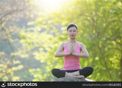 Yoga lady practicing in park outdoor, Meditation, Exercise.