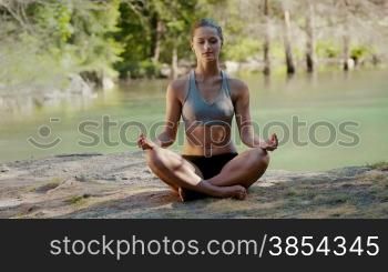 Yoga, meditation, people and health, pretty young woman smiling during lotus position. Part 2 of 7