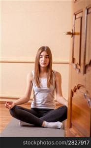 yoga meditation pretty blond in studio