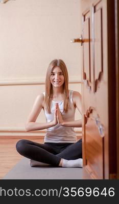 yoga meditation pretty blond in studio