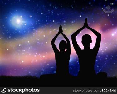 yoga, mindfulness and harmony concept - black silhouette of couple meditating over space background. black silhouette of couple meditating over space. black silhouette of couple meditating over space
