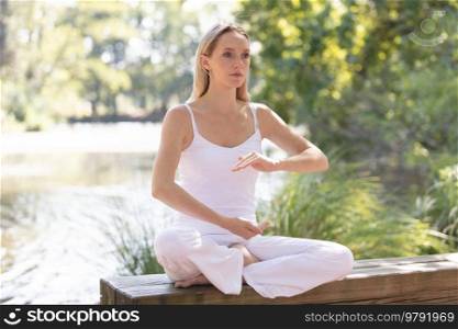 yoga outdoors in warm autumn park