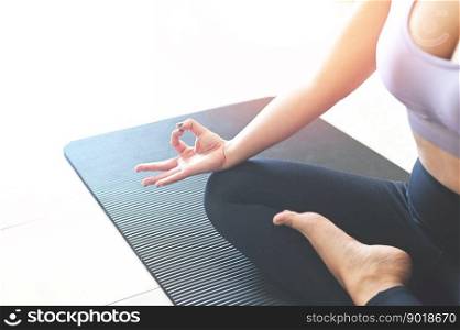 yoga woman in home, yoga pose lesson breathing meditation exercise working out wearing sportswear, women doing exercising at home indoor well being wellness young girl people do practicing yoga indoor