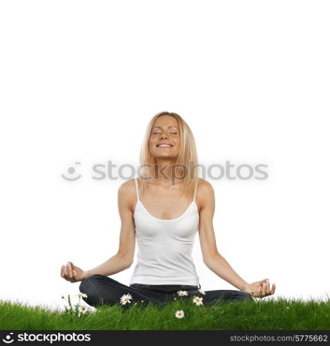 Yoga woman on green grass in lotus pose, isolated on white background