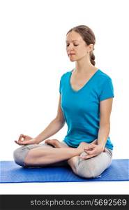 Yoga - young beautiful woman yoga instructor doing Lotus Position (padmasana with chin mudra) asana exercise - cross-legged sitting asana for meditation - isolated on white background