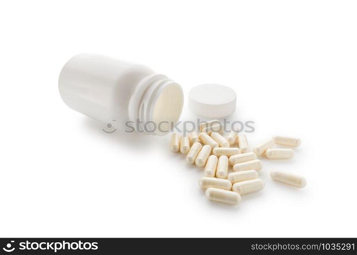 Yoghurt capsules isolated on a white background. Yoghurt Capsules aid in maintaining a normal healthy gastrointestinal system and digestive function.