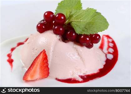 Yogurt mousse with cherry juice close up