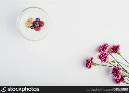 yogurt near flowers