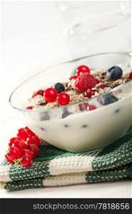 yogurt with cereal and wild berries