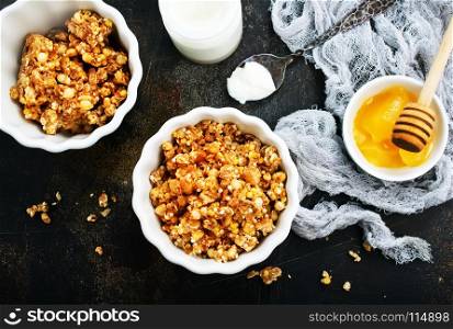 yogurt with granola on a table, stock photo