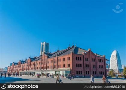 Yokohama, Japan - January 4, 2013. Tourist and visitors at Yokohama Red Brick Warehouse. The historical warehouse was converted to a shopping mall, banquet hall, and event venues in 2002.
