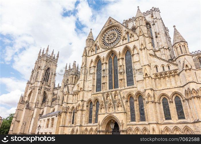 York minster Cathedral with cloudy blue sky, York, England UK.