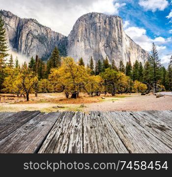 Yosemite National Park Valley at cloudy autumn morning. Low clouds lay in the valley. California, USA.