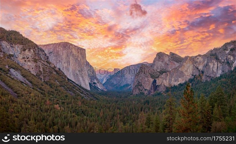 Yosemite valley nation park during sunset view from tunnel view on twilight time. Yosemite nation park, California, USA. Panoramic image.. Yosemite valley nation park during sunset view from tunnel view on twilight time.