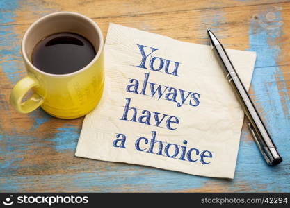 You always have a choice - handwriting on a napkin with a cup of espresso coffee