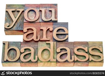 you are badass - isolated word abstract in letterpress wood type printing blocks stained by color inks