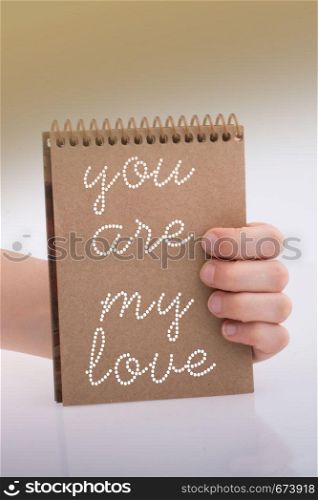 You are my love text in hand over white background