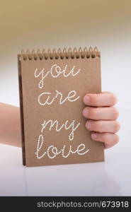 You are my love text in hand over white background