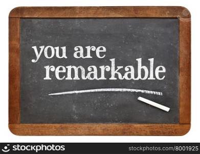 You are remarkable - positive affirmation words on a vintage slate blackboard