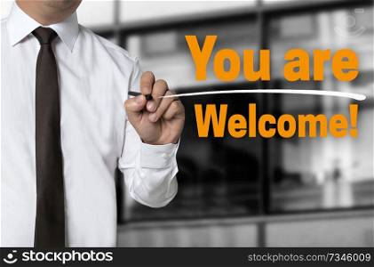 You are Welcome is written by businessman background concept.. You are Welcome is written by businessman background concept