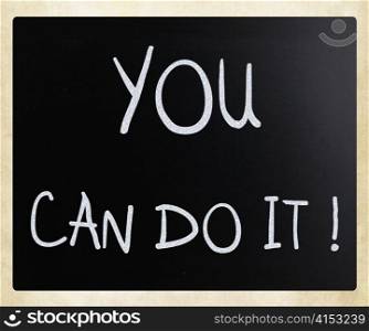 ""You can do it" handwritten with white chalk on a blackboard"