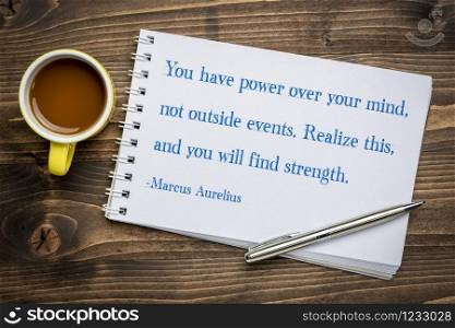 You have power over your mind, not outside events ... - ancient Roman Emperor and stoic philosopher Marcus Aurelius inspirational quote - handwriting in an art sketchbook against grained wood with a cup of coffee, personal development and self improvement concept.