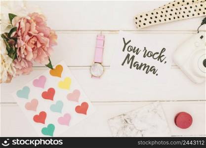 you rock mama inscription with flowers hearts