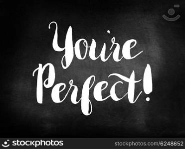 You&rsquo;re perfect written on a blackboard