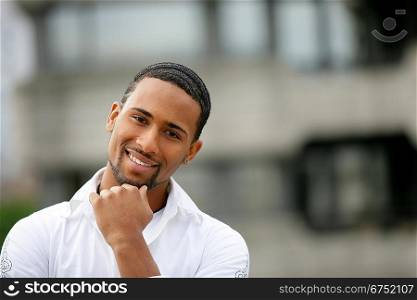 Younf african man posing outside