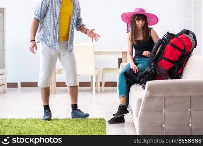 Young active pair preparing for honeymoon trip