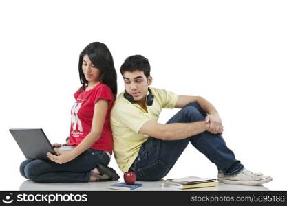 Young adult couple with laptop