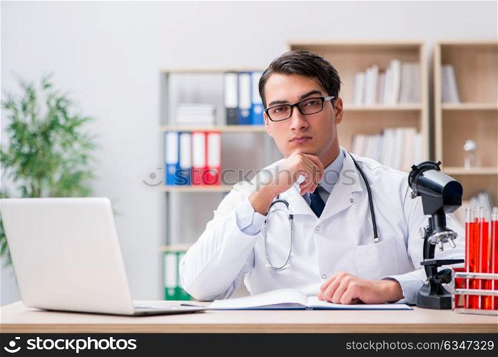 Young adult doctor working in the hospital