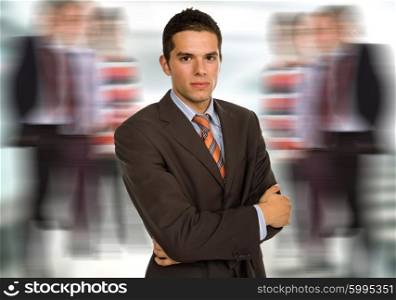 young adult executive man standing alone thinking