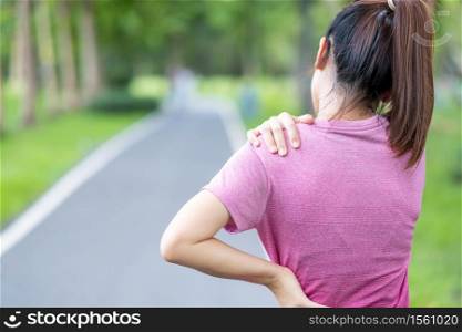 Young adult female with his muscle pain during running. runner woman having back body ache due to Piriformis Syndrome, Low Back Pain and Spinal Compression. Sports injuries and medical concept