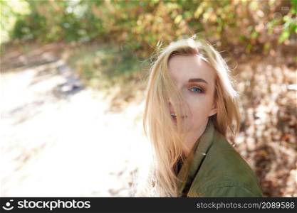 Young adult woman spending quality time in the forest